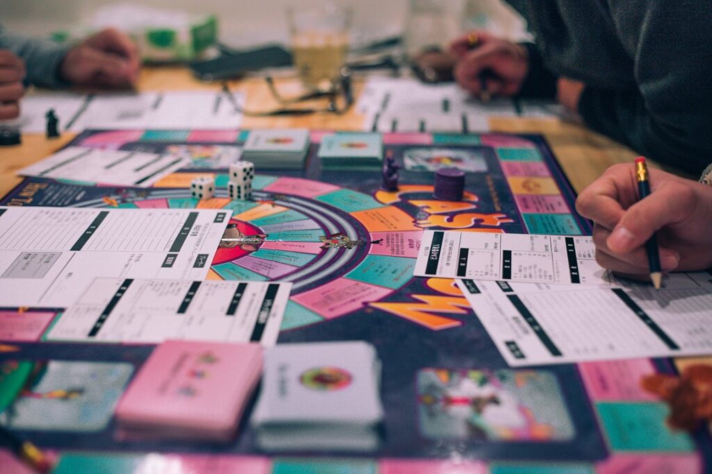 Playing roll and write board games | Featured image of the Roll & Write Games Worth Playing blog page